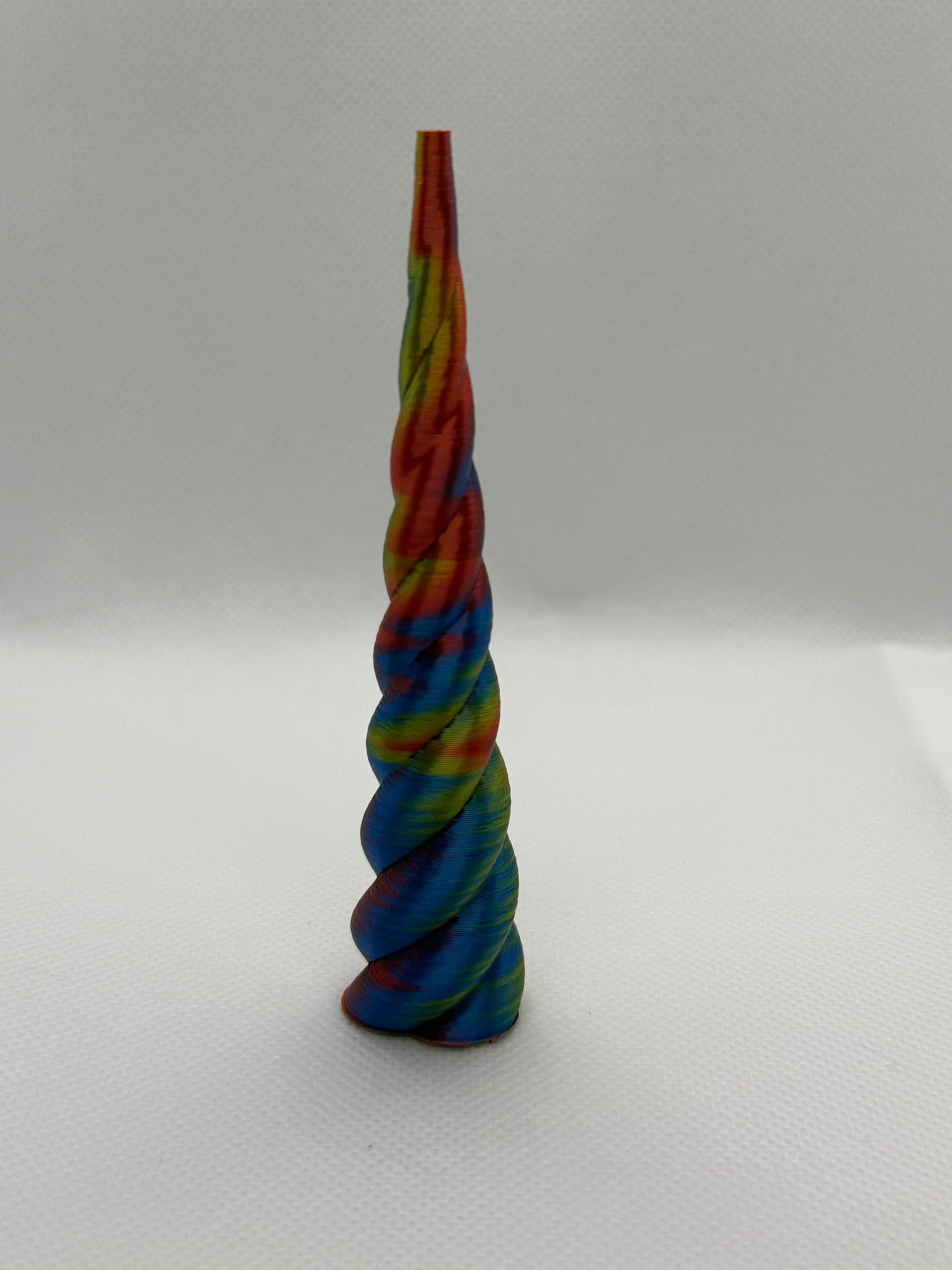 Red, yellow, blue unicorn ring cone